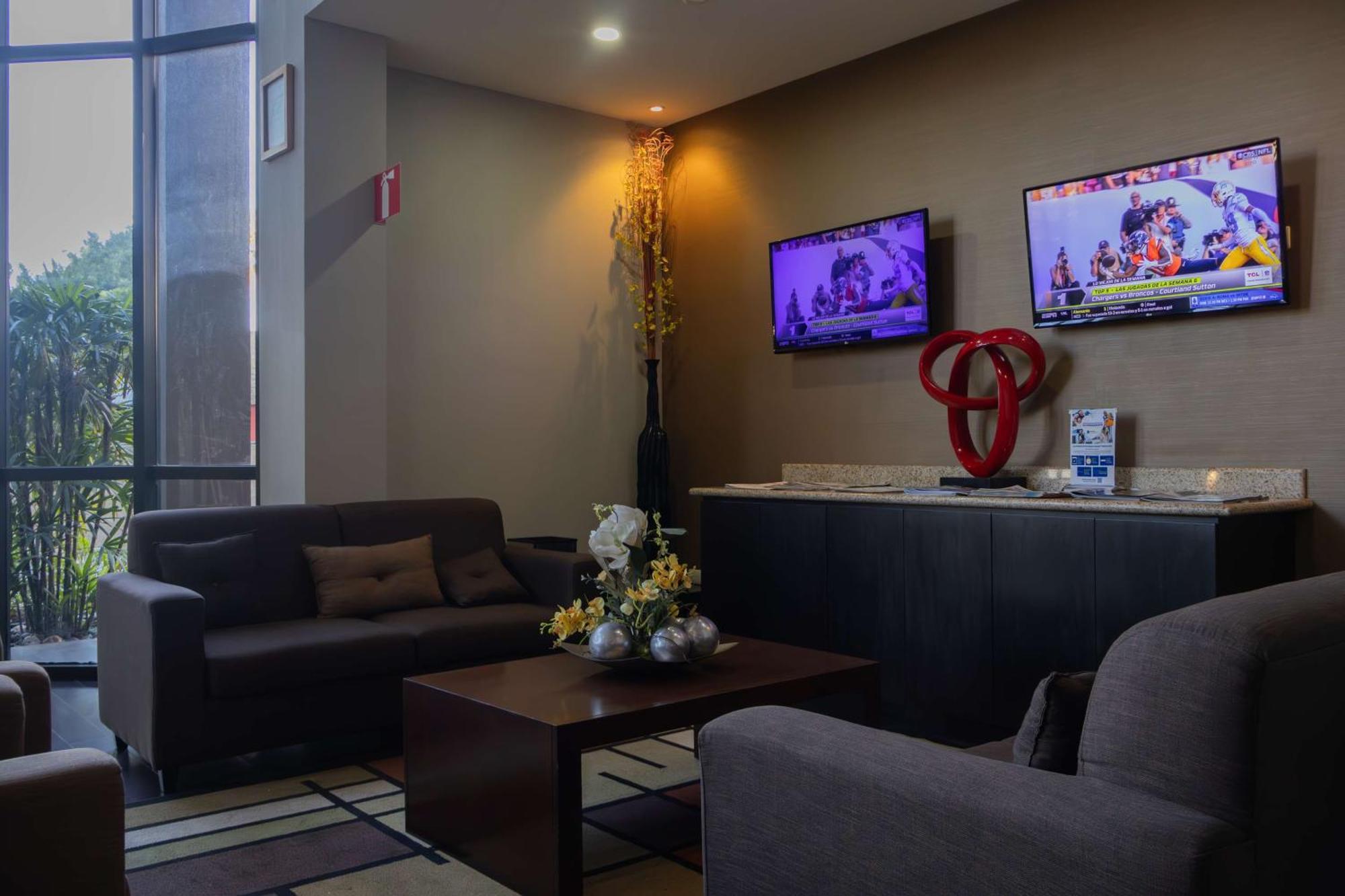 Best Western Premier Monterrey Aeropuerto Apodaca Dış mekan fotoğraf The lobby of the hotel