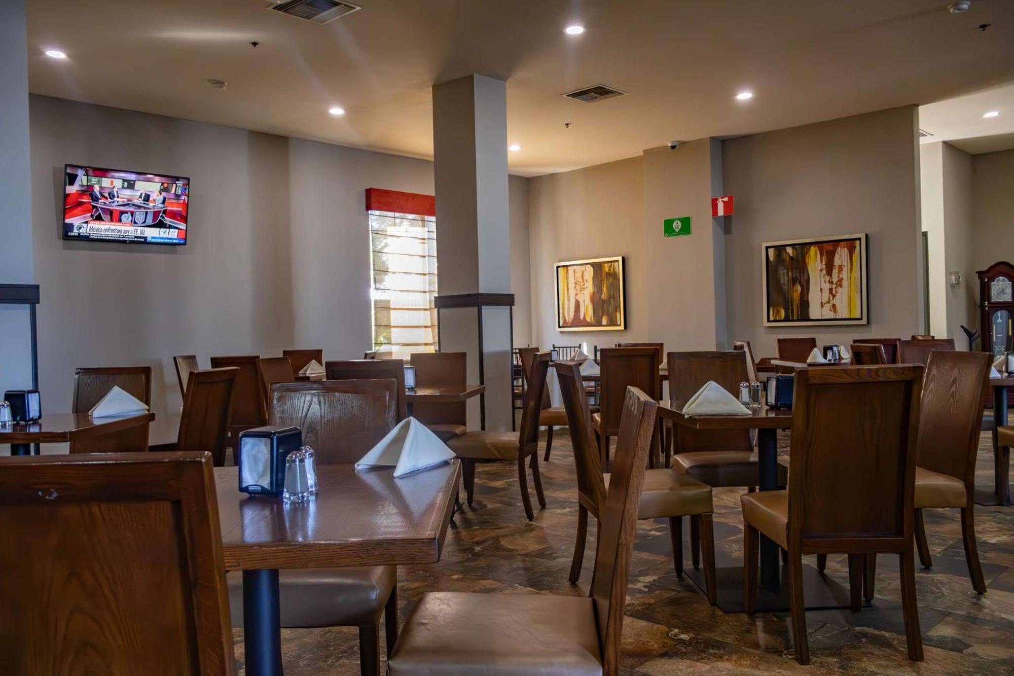 Best Western Premier Monterrey Aeropuerto Apodaca Dış mekan fotoğraf The dining room at the restaurant